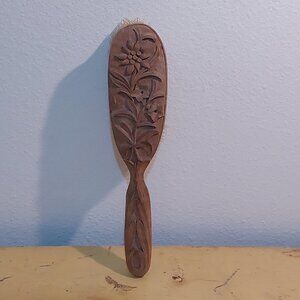Vintage hand carved wood hairbrush